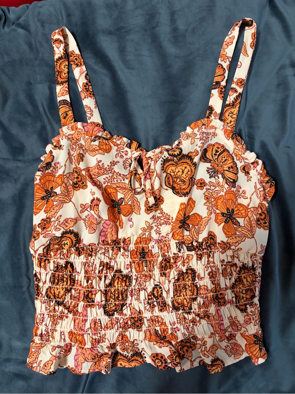Sienna Sky Orange Floral Smocked Crop Tank